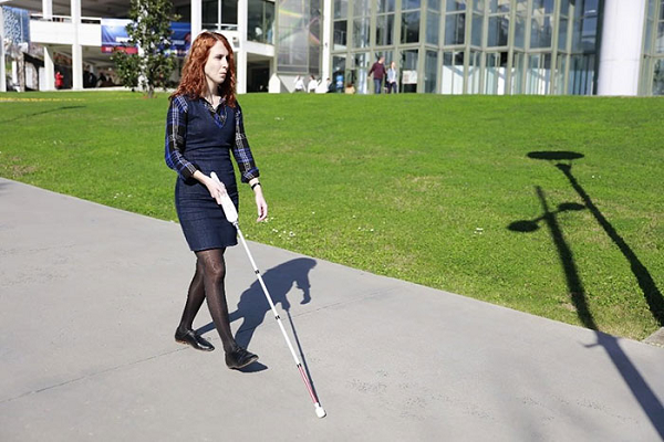 visually impaired person using smart cane - WeWalk Smart Cane Guides Visually Impaired During Pandemic With ...