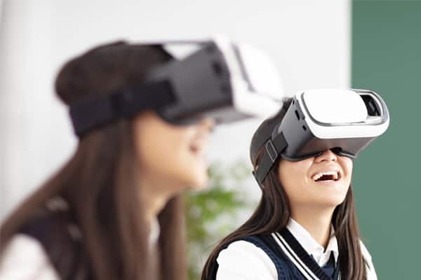 student using augmented reality glasses in classroom - VR for Education - The Future of Education | Immersion VR