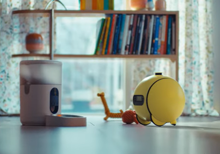 AI robot ball projecting on wall - A Day in the Life With Ballie: An AI Companion Robot for the Home