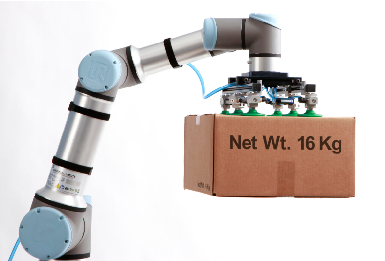 Robotic arm with vacuum gripper handling multiple components - Robot arm with vacuum gripper, potentially suitable for lifting ...