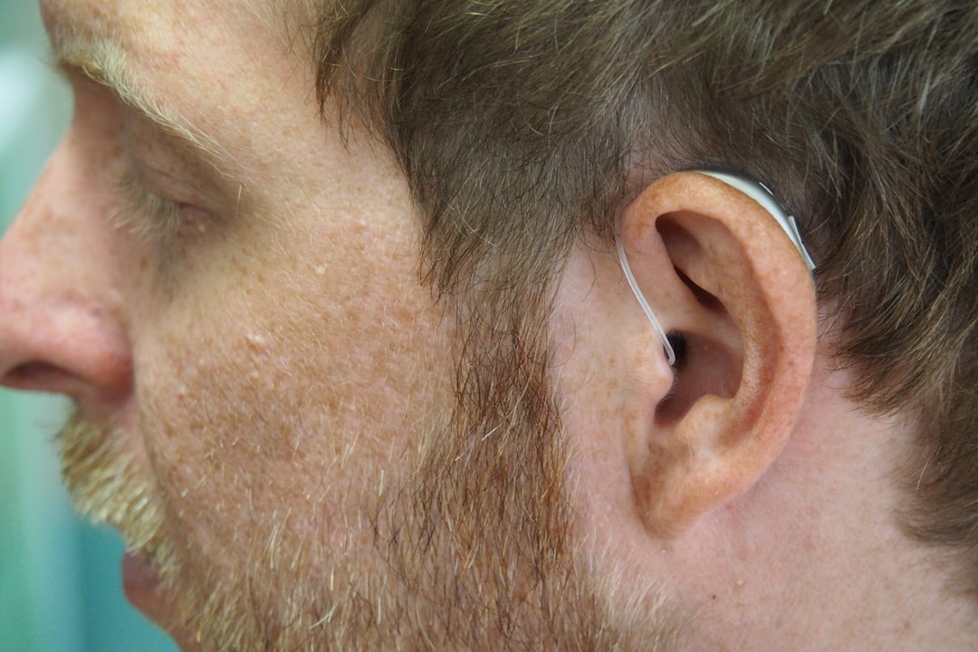modern hearing aid close up - Open ear fitting, receiver in canal, hearing aid
